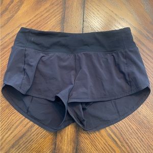 Speed Up Low-Rise Lined Short 2.5". Size 4, Black.
